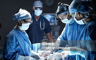 team-of-surgeons-performing-surgery-in-operating-room.jpg